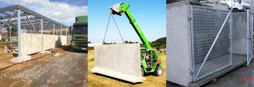 Precast concrete wall panels being delivered and lifted into place at a cowshed build